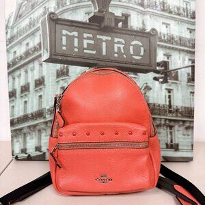 Coach F45070 Mini Charlie Backpack In Pebble Leather Coral